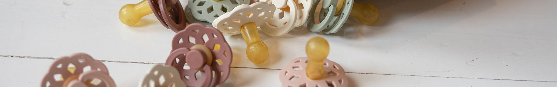 Natural rubber latex pacifiers
