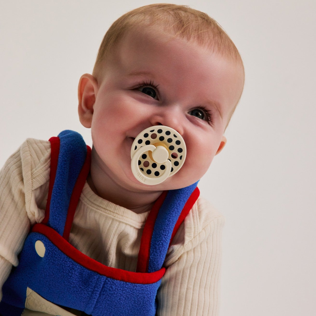 STUDIO Colour Pacifier Polka - Ivory/Deep Space
